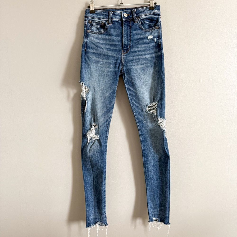 American Eagle Medium Wash Super High Rise Distressed Jegging Size 2